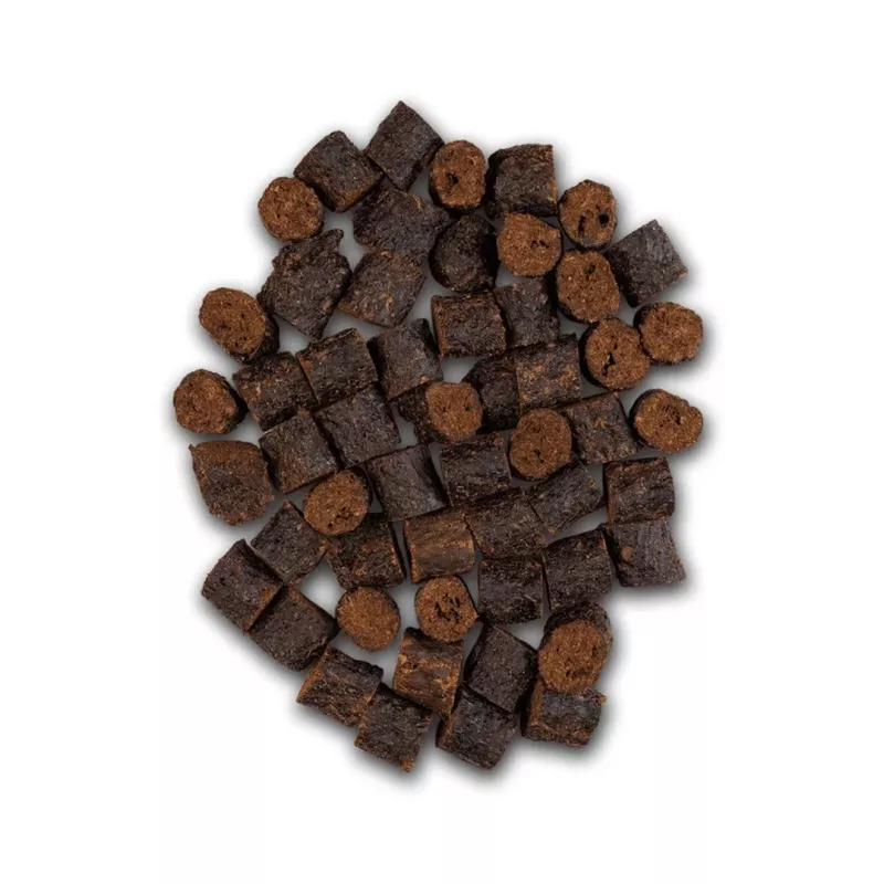 Suņu našķi UNISZKI Crunchy Rabbit ar mētru un nātru 80 g — truša gaļas, mētras, nātres kraukšķīgas uzkodas