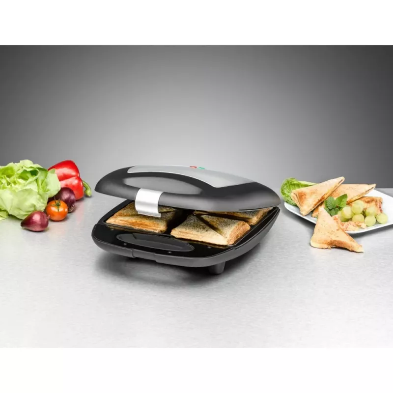 Sendviču pagatavotājs Rommelsbacher ST 1410 — 4 sendviči, 1400 W, nepiedegošas plates, melns/sudraba