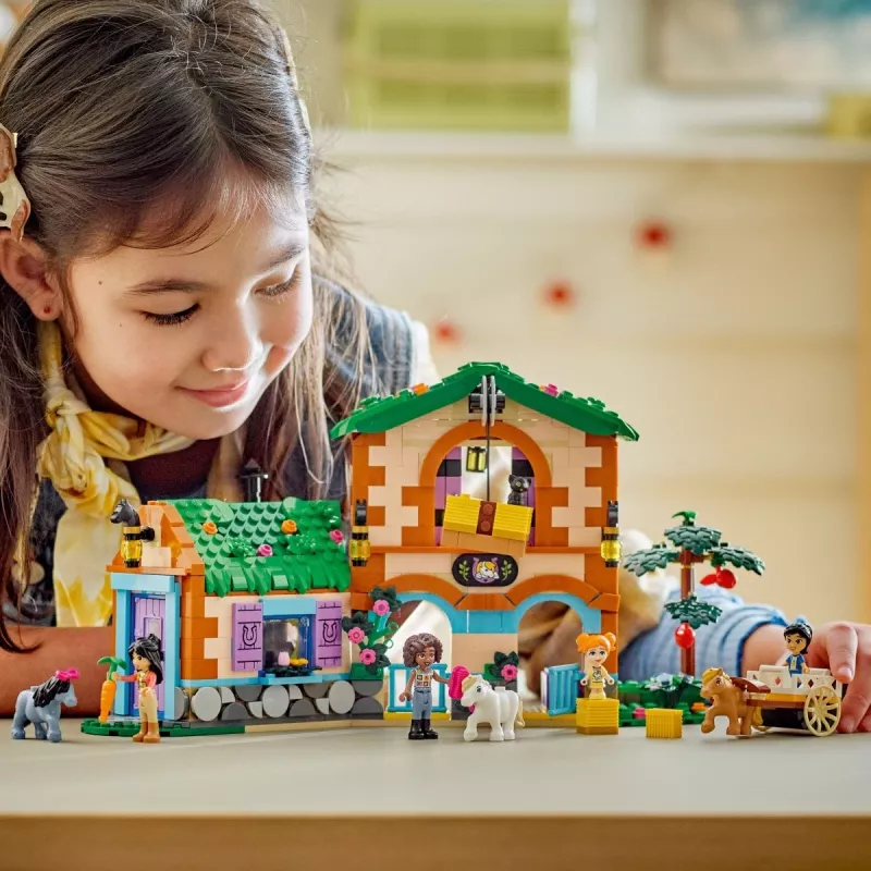 Būvniecības rotaļlieta LEGO Friends Mūzikas veikala un dzīvokļa komplekts 42653 – moduļu spēļu komplekts vecumiem (LEGO zīmols)