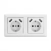 Delock sienas kontaktligzda ar 2 ligzdām un 4 USB pieslēgvietām, 2 x 2,8 A