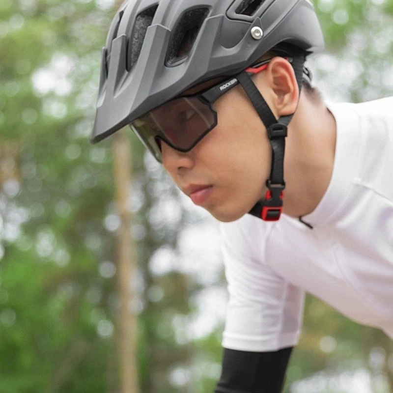 Rockbros 10135 UV400 fotohromiskas riteņbraukšanas brilles, melnas un sarkanas