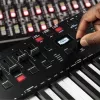 M-Audio Oxygen Pro 49 MIDI klaviatūras kontrolleris — 49 taustiņi, 16 spilventiņi, 9 faderi, OLED displejs, USB, MIDI izeja