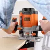 Frēze/apgriešanas iekārta Melns & Decker KW1200EKA-QS — kompakta frēze ar regulējamu dziļuma iestatījumu, ergonomisku dizainu
