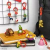 Backpack Buddies atslēgu piekariņu komplekts Paladone Super Mario CDU 24 gab. – dažādi tēli, kolekcionējami aksesuāri