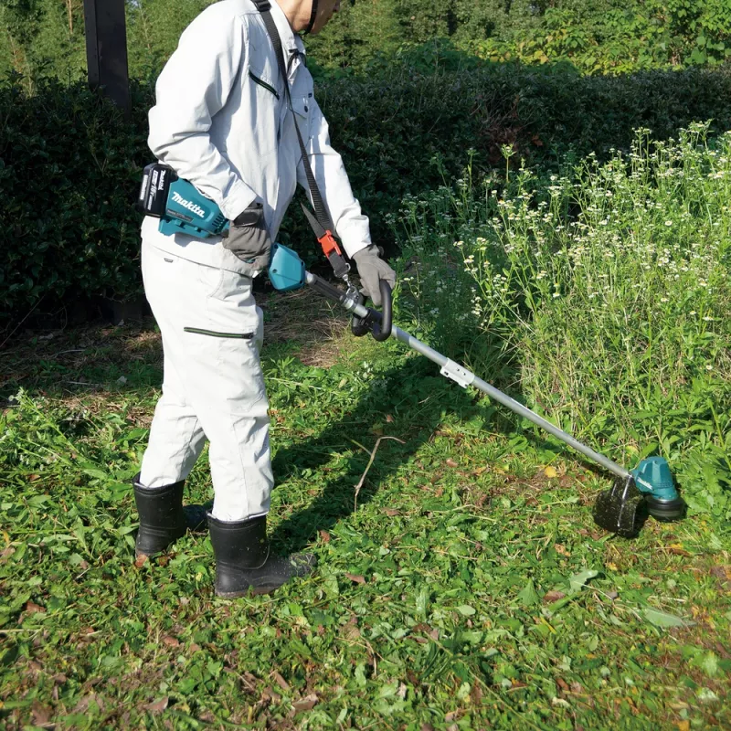 Makita DUR192LRT1, zāles trimmeris, J-veida rokturis, 6000 apgr./min, melns, tirkīza, 30 cm, 87,8 dB