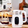 Elektriskā tējkanna Adler AD 1305WG — 1,7 l, 2200 W, stikls/plastmasa, balts/zelta/caurspīdīgs