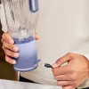 Pārnēsājamais blenderis Ninja BC251EULD — 0,57 L bļoda, baterija 11,1 V, nerūsējošā tērauda asmeņi, lavandas/caurspīdīgs