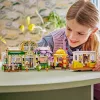LEGO komplekts LEGO FRIENDS 42671 Augu kafejnīcas un ziedu veikala rotaļu komplekts ar kafejnīcas un ziedu veikala funkcijām