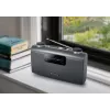 Portatīvais radio Muse M-058 R — AM/FM, rotējoša skaļuma regulēšana, baterijas vai maiņstrāva (230V, 50Hz), melns/pelēks