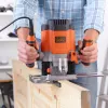 Frēze/apgriešanas iekārta Melns & Decker KW1200EKA-QS — kompakta frēze ar regulējamu dziļuma iestatījumu, ergonomisku dizainu