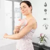 Rokas rullīšu masieris Medisana AC 950 — bezvada Li‑Ion, 2 jaudas līmeņi, ergonomiski rokturi, 381 g, rožu zelts/baltā
