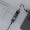 SAVIO USB-A centrmezgls ar RJ-45 Gigabit Ethernet AK-57 — 3× USB-A + RJ-45, USB 3.2 Gen 1 Micro‑B resursdators, 5 Gbit/s, 4 porti, pelēks