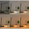 LED galda lampa Aukey LT-T10 12W 3000–6500K — regulējama krāsu temperatūra, melna