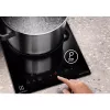 Indukcijas plīts virsma Electrolux LIT30230C — 2 zonu iebūvējama, 29 cm plata, melna, skārienjutīga vadība, 210/145 mm zonas