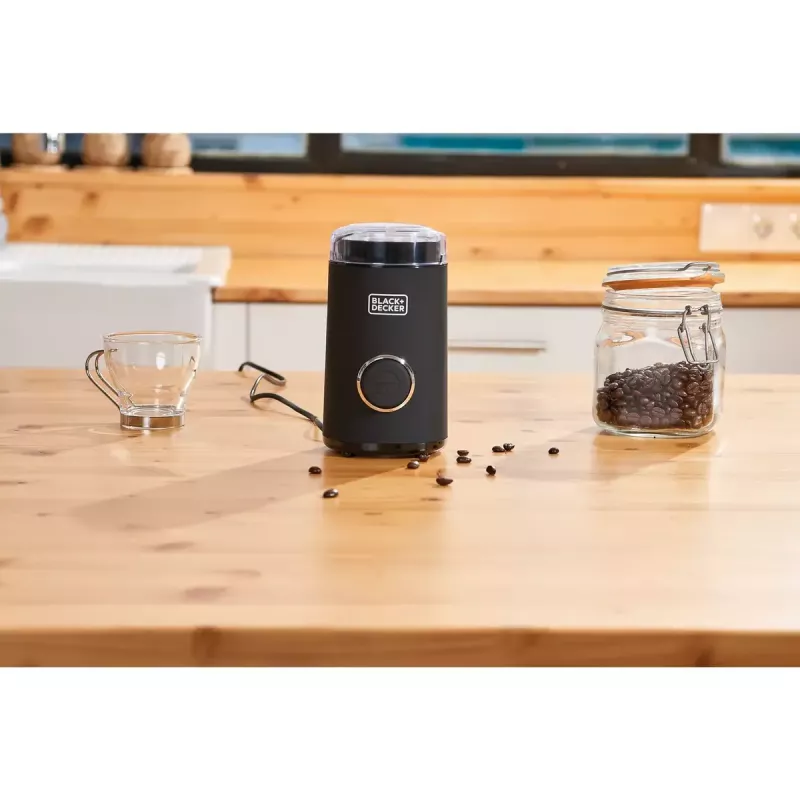 Kafijas dzirnaviņas Melns & Decker BXCG150E — 150 W, 50 g ietilpība, nerūsējošā tērauda asmeņi, pogu vadība