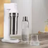 Sodas aparāts BRITA Carbonator 1046730 balts — kompakts galda virsmas karbonators ar 2 pudelēm (292×250×513 mm)