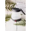 Elektriskā tējkanna Adler AD 1279 — 0,6 L, 750 W, plastmasas korpuss, pogu vadība, indikatora gaisma