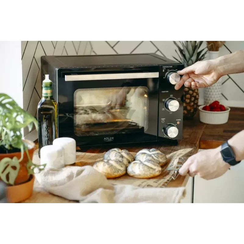 Electric countertop oven Adler AD 6024 — compact 22 L capacity, 1300 W, Melns