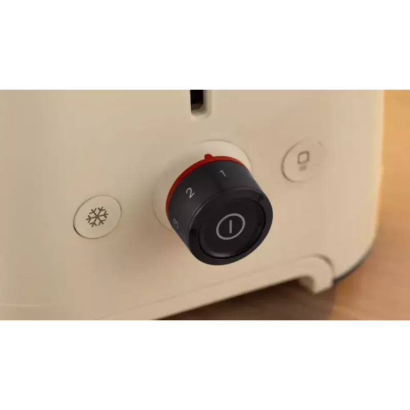 Tosteris Bosch Compact TAT3M127 — 2 šķēlīšu bēša plastmasas korpusa, kompakts dizains