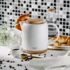 Elektriskā tējkanna Adler AD 1304 — 1 L, 1200 W, keramikas korpuss, verams vāks, 360° rotējoša pamatne, balta