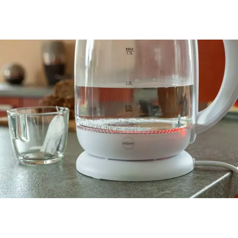Elektriskā tējkanna Eldom C510B 1,7 L 2200 W Balta — stikla un plastmasas korpuss, poga vākam, bezvada 360° pamatne