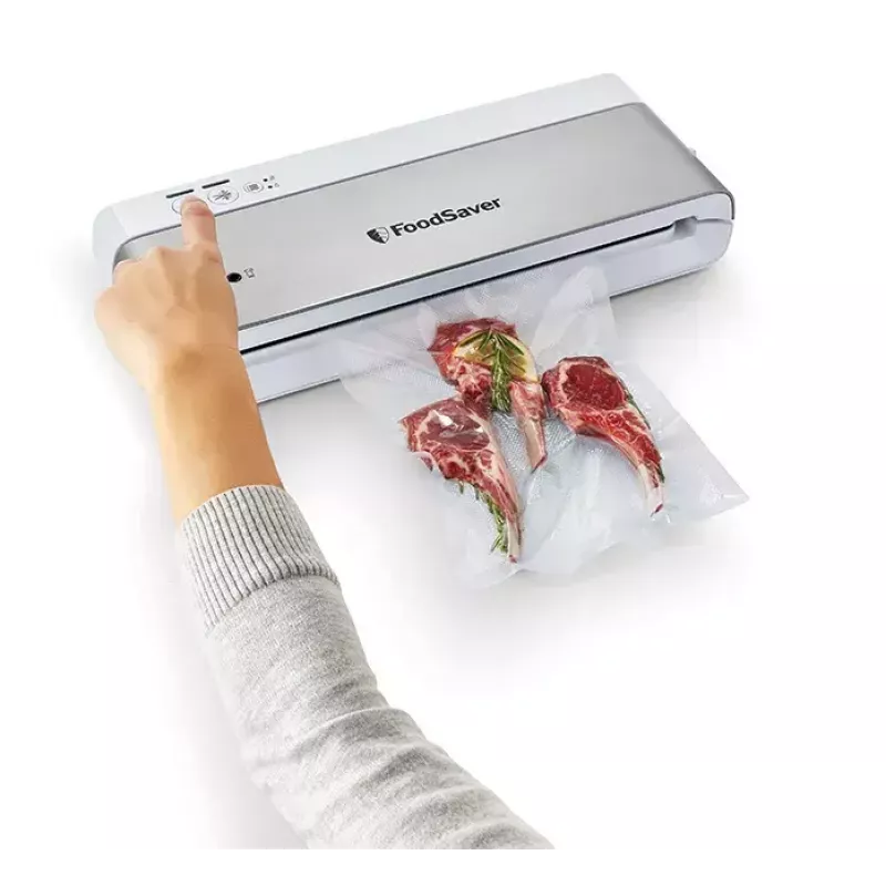 Vakuuma aizzīmogotājs FoodSaver VS0100X — rotējoša vadība, komplektā rullis un 4 vakuuma maisi, sudrabaini balts