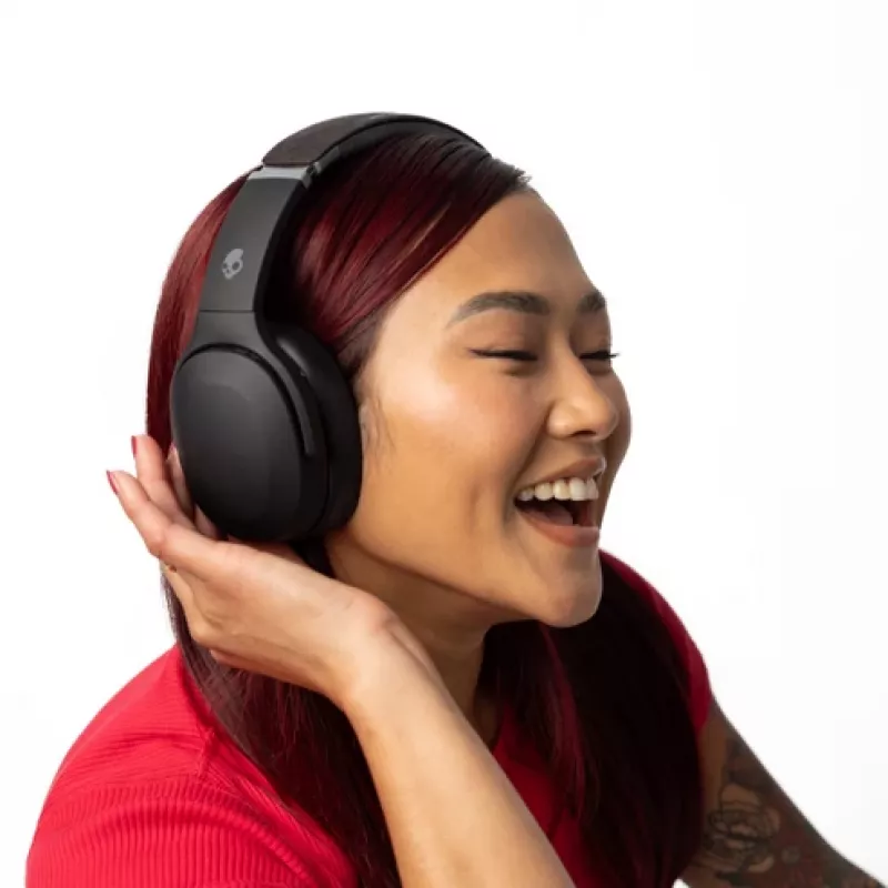 Austiņas Skullcandy Crusher Evo — bezvadu un vadu apkārtauss austiņas, Bluetooth 5.0, 40 h akumulators, USB-C, 3,5 mm, salokāmas, melnas