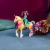 Usorteret Unicorn Academy Ava & Leaf Power of Friendship mini leļļu komplekts ar caurspīdīgiem segliem un 2 aksesuāriem, 168 mm, plastmasa