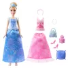 Disney Princess 2-in-1 Stories Pelnrušķītes modes lelle ar 2 uzspiežamiem ņiebura daļām, 2 svārkiem un 9 piederumiem