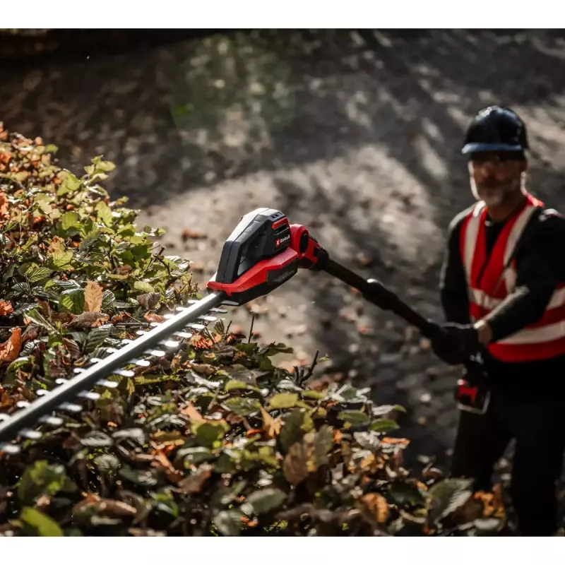 Bezvada teleskopiskās dzīvžoga šķēres EINHELL GP-HH 18/50 Li T BL-Solo — 18 V, 50 cm griešanas sliedes, teleskopiska sniedzamība