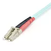StarTech.com 1m (3 pēdas) LC/UPC uz LC/UPC OM3 daudzmodu optiskās šķiedras kabelis, pilna dupleksa 50/125 µm rāvējslēdzēja tipa optiskās šķiedras kabelis, 100G, zemi ievades zudumi, LSZH optiskās šķiedras džempera vads