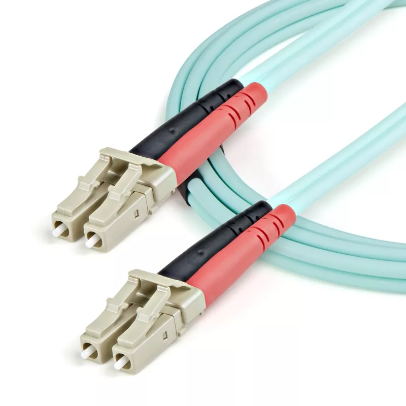 StarTech.com 1m (3 pēdas) LC/UPC uz LC/UPC OM3 daudzmodu optiskās šķiedras kabelis, pilna dupleksa 50/125 µm rāvējslēdzēja tipa optiskās šķiedras kabelis, 100G, zemi ievades zudumi, LSZH optiskās šķiedras džempera vads