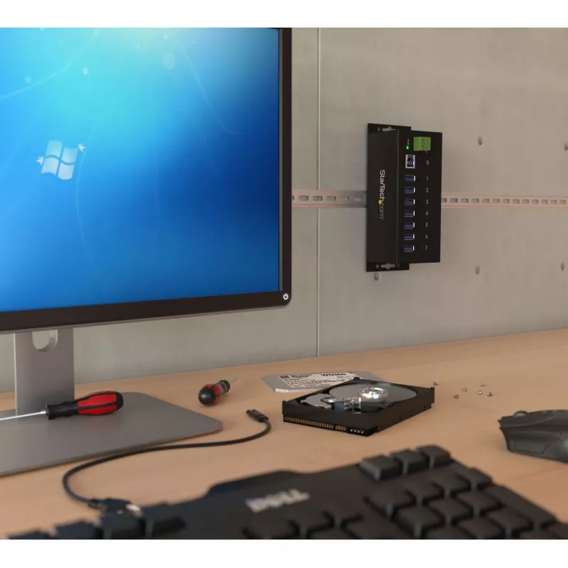 StarTech.com 7 portu rūpnieciskais USB 3.0 centrmezgls ar ESD aizsardzību~7 portu USB 3.0 centrmezgls (5 Gbps) - metāla rūpnieciskais USB-A centrmezgls ar ESD aizsardzību un 350 W pārsprieguma aizsardzību - DIN sliedes, sienas vai galda stiprinājums - TAA atbilstošs USB paplašinātājs
