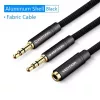 Audio adaptera kabelis Vention 2×3,5 mm vīrišķais uz 4-polu 3,5 mm sievišķo, 0,3 m, melns