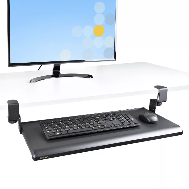 StarTech.com Zemgalda tastatūras paliktnis, pieskrūvējams ergonomisks tastatūras turētājs, līdz 12 kg (26,5 lb), bīdāma tastatūras un peles atvilktne ar C veida skavām, augstumā regulējams tastatūras paliktnis (3,9/4,7/5,5 collas)