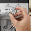 Espresso automāts KRUPS XP801T pusautomātiskais ar iebūvētu dzirnaviņu, 3 L ūdens tvertne, 2 krūzīšu padeve, melns/nerūsējošais tērauds