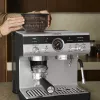 Espresso automāts KRUPS XP801T pusautomātiskais ar iebūvētu dzirnaviņu, 3 L ūdens tvertne, 2 krūzīšu padeve, melns/nerūsējošais tērauds