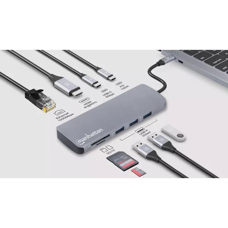 Manhattan USB-C dokstacija/rumbis ar karšu lasītāju, pieslēgvietas (7): Ethernet, HDMI, USB-A (3) un USB-C (2), ar Power Delivery (PD) 100 W – nepieciešams ārējs USB-C lādētājs (nav iekļauts). Darbināms ar USB (nav nepieciešams ārējs barošanas avots), ja PD netiek izmantots