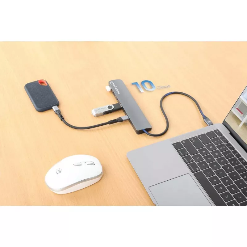 Manhattan USB-C dokstacija/centrmezgls, 7 pieslēgvietas (3x USB-A, 3x USB-C), ar Power Delivery (PD) 100 W – nepieciešams ārējs USB-C lādētājs (nav iekļauts). Barošana caur USB (nav nepieciešams ārējs barošanas avots), ja PD netiek izmantots, alumīnija korpuss