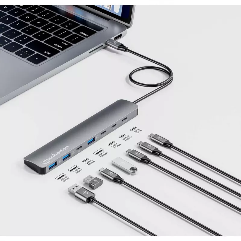 Manhattan USB-C dokstacija/centrmezgls, 7 pieslēgvietas (3x USB-A, 3x USB-C), ar Power Delivery (PD) 100 W – nepieciešams ārējs USB-C lādētājs (nav iekļauts). Barošana caur USB (nav nepieciešams ārējs barošanas avots), ja PD netiek izmantots, alumīnija korpuss