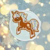 LAUT MAGMOJI BADGE – Unicorn Cookie Christmas Edition nozīmīte, PVC un silikons, brūna/gaiši zila, 1 gab.
