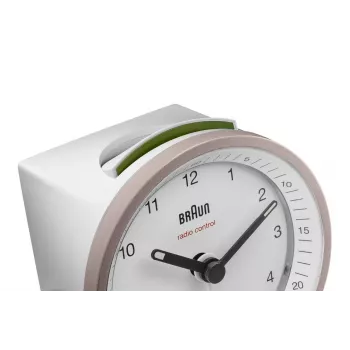 Braun BC07 kvarca modinātājpulkstenis rozā, baltā krāsā