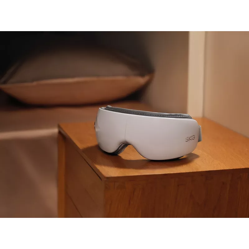 Acu masāžas ierīce SKG ES500, balta — kompresija, siltums, 10 W, iebūvēts akumulators, 270 g