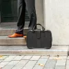 R-Go Tools klēpjdatora soma R-Go Viva, pilngraudu āda, ar integrētu klēpjdatora statīvu, plecu siksna, 15,6 collas, melna