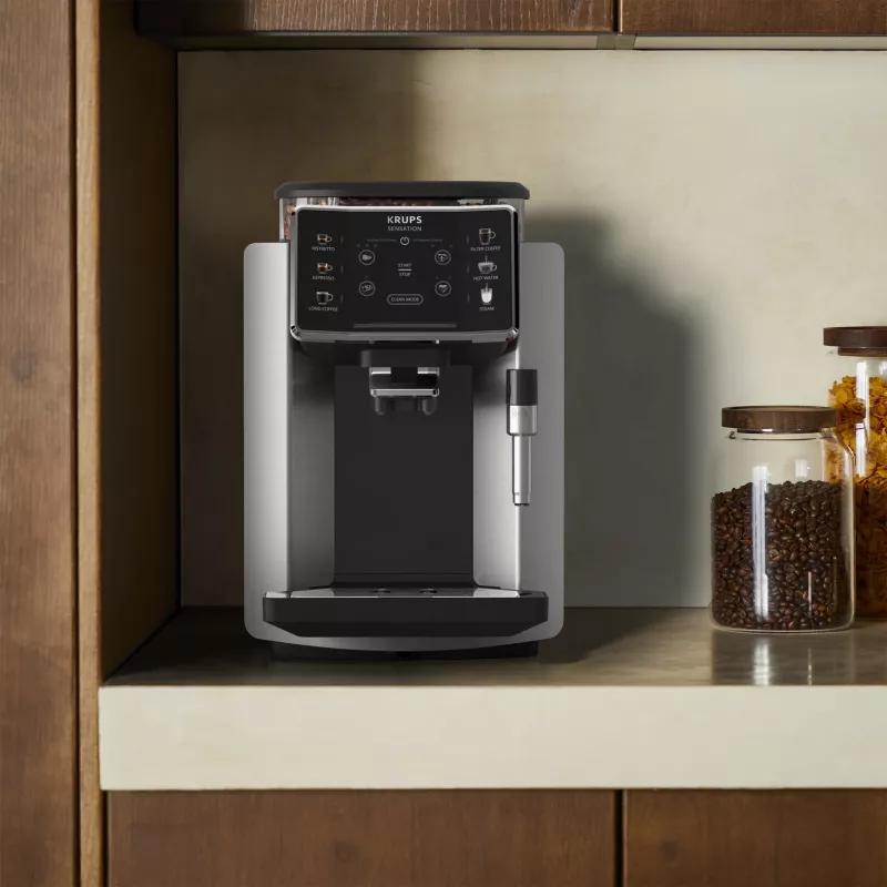 Espresso automāts KRUPS Sensation EA910E — pilnībā automātisks, 1,7 l ūdens tvertne, iebūvēta dzirnaviņas, 2 snīpi, 1450 W