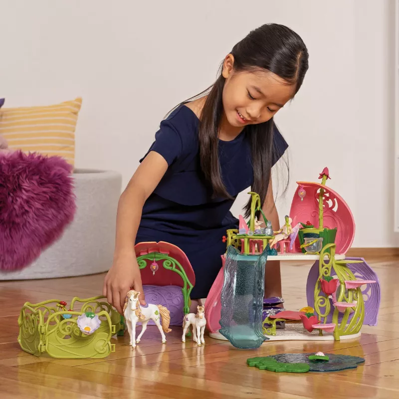 schleich BAYALA Mirdzošā ziedu māja ar vienradžiem, ezeru un stalli