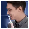 Oral-B iO 6S pieaugušo vibrējošā zobu birste Rozā, Balta