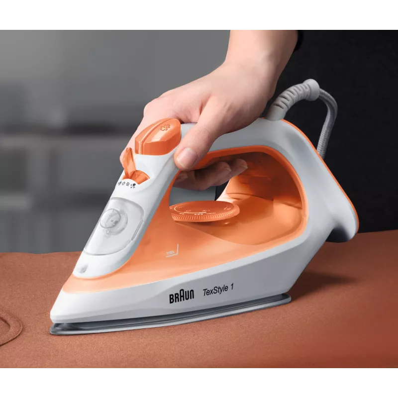 Braun TexStyle 1 SI1009OR tvaika gludeklis ar nepiedegošu zoli 1900 W oranžs, balts