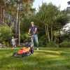 Melns & Decker elektriskais zāles pļāvējs ar pļaušanas augstuma regulēšanu, augstumā regulējams salokāms rokturis