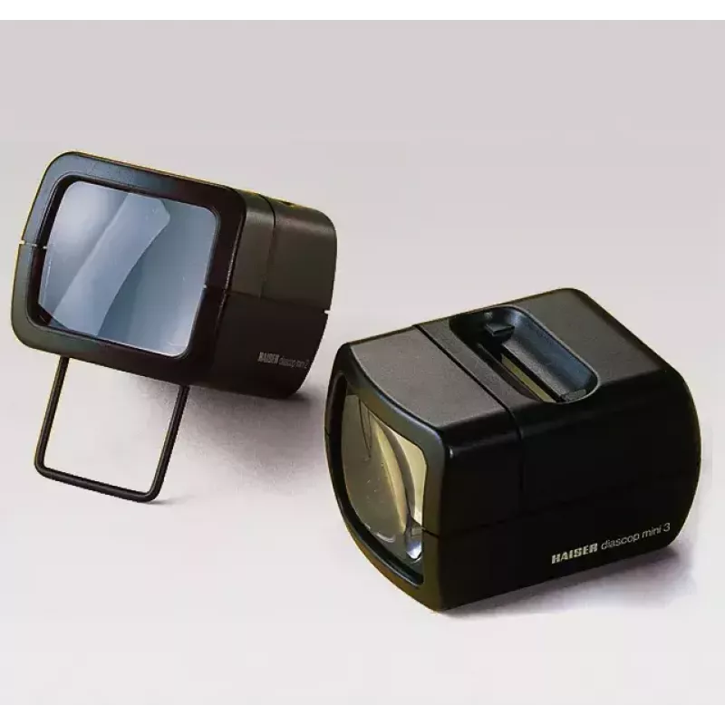 Kadru projektors KAISER 2010 — kompakts 3× palielinājums, 75×105×60 mm, 1,5 V baterija